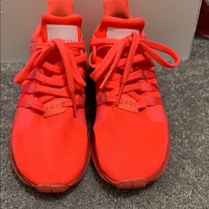 Neon pink adidas EQT sneakers